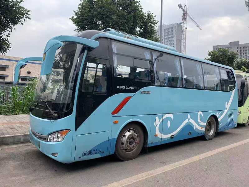 2014年8月上牌35座国四可提双档金龙6859气囊旅游车